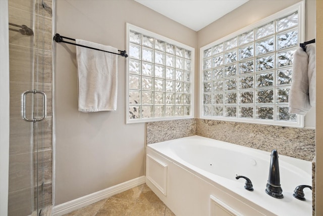 12511 Wealdstone Dr, Tomball, TX 77377 - bathroom featuring a whirlpool tub, a shower stall, and healthy amount of natural light