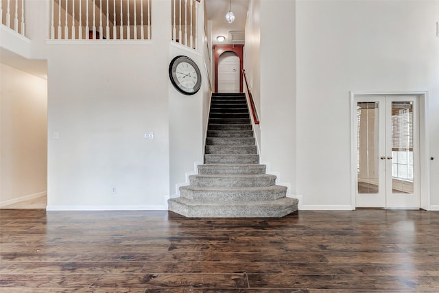 13351 Arlon Trl, Houston, TX 77082 - stairs with a high ceiling, french doors, and wood finished floors