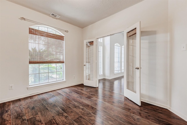 13351 Arlon Trl, Houston, TX 77082 - entrance foyer featuring french doors and dark wood-style flooring