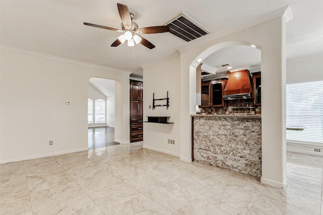 13351 Arlon Trl, Houston, TX 77082 - unfurnished living room with arched walkways, a ceiling fan, ornamental molding, and light marble finish flooring