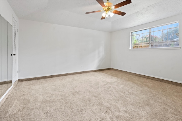 7019 Pyron Way, Houston, TX 77036 - spare room featuring carpet floors, ceiling fan, and a textured ceiling