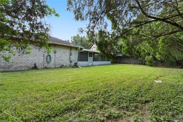 7019 Pyron Way, Houston, TX 77036 - view of yard with a sunroom