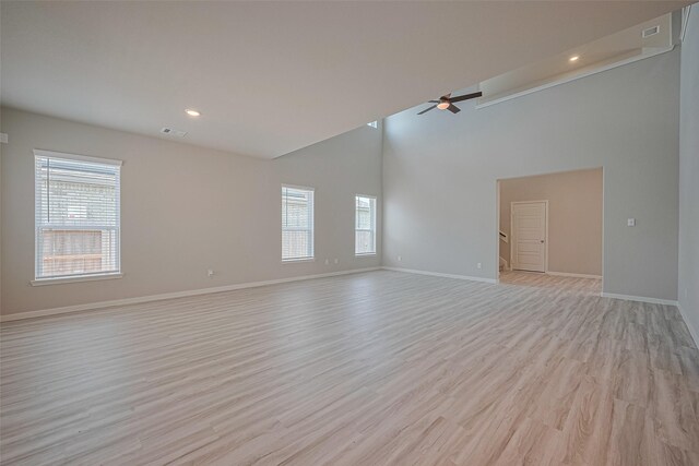 5819 Capri Forest Dr, Katy, TX 77493 - unfurnished room with ceiling fan, high vaulted ceiling, recessed lighting, and light wood-style flooring