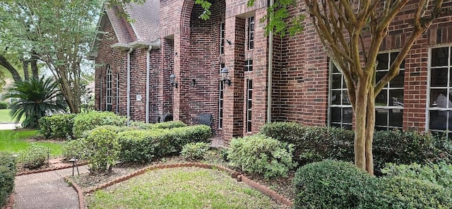 5322 Norborne Ln, Houston, TX 77069 - view of side of home featuring brick siding