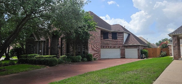 5322 Norborne Ln, Houston, TX 77069 - view of front of house featuring brick siding, concrete driveway, a garage, and roof with shingles