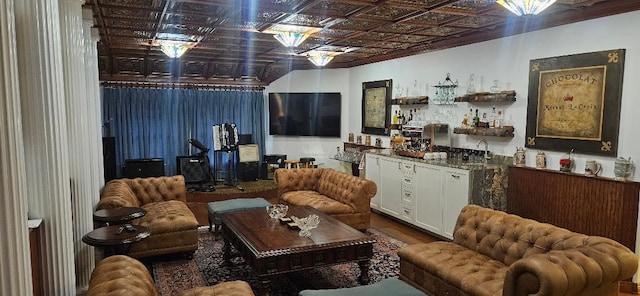 5322 Norborne Ln, Houston, TX 77069 - living room with an ornate ceiling, wet bar, and wood finished floors
