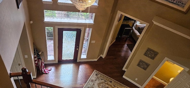5322 Norborne Ln, Houston, TX 77069 - foyer featuring a towering ceiling, wood finished floors, and a chandelier