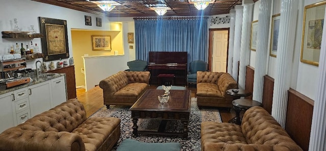 5322 Norborne Ln, Houston, TX 77069 - living room with an ornate ceiling and bar with sink