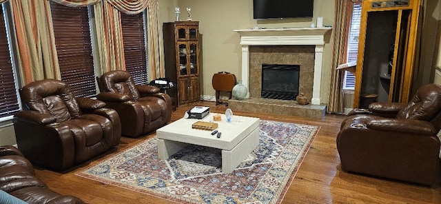 5322 Norborne Ln, Houston, TX 77069 - living area featuring wood finished floors and a fireplace