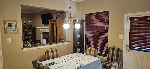 5322 Norborne Ln, Houston, TX 77069 - dining room featuring ornamental molding and a chandelier