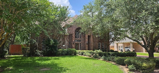 5322 Norborne Ln, Houston, TX 77069 - view of front facade featuring brick siding