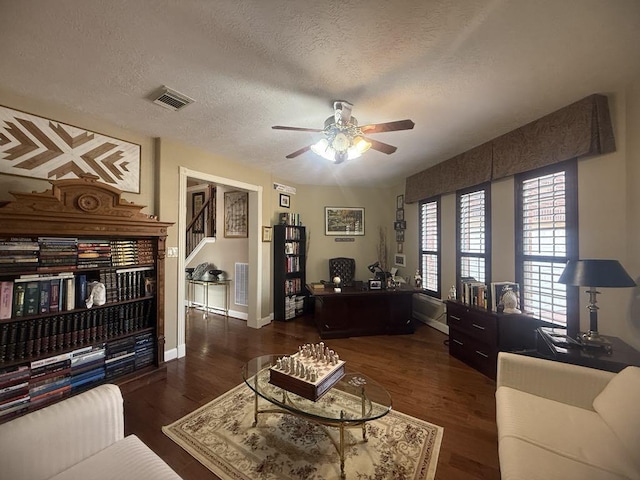 5322 Norborne Ln, Houston, TX 77069 - living room with an office area, ceiling fan, wood finished floors, and a textured ceiling