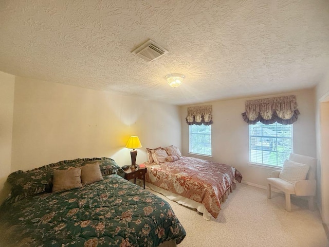 5322 Norborne Ln, Houston, TX 77069 - bedroom featuring carpet floors and a textured ceiling
