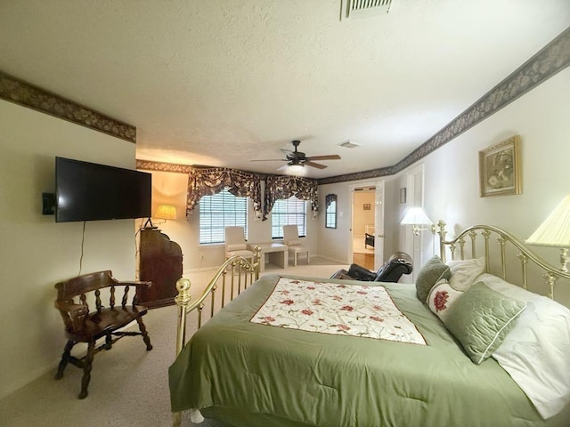 5322 Norborne Ln, Houston, TX 77069 - carpeted bedroom with a ceiling fan and a textured ceiling