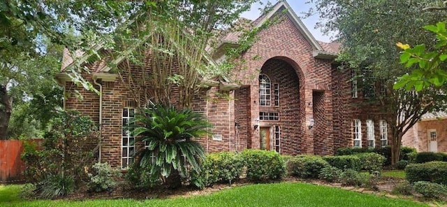 5322 Norborne Ln, Houston, TX 77069 - view of front facade featuring brick siding
