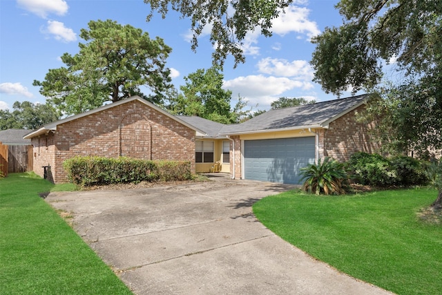 14138 Rosetta Dr, Cypress, TX 77429 - single story home featuring brick siding, a front lawn, a garage, and concrete driveway