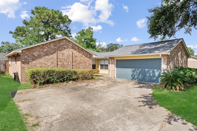14138 Rosetta Dr, Cypress, TX 77429 - view of front of house with brick siding, a garage, concrete driveway, a front lawn, and a shingled roof