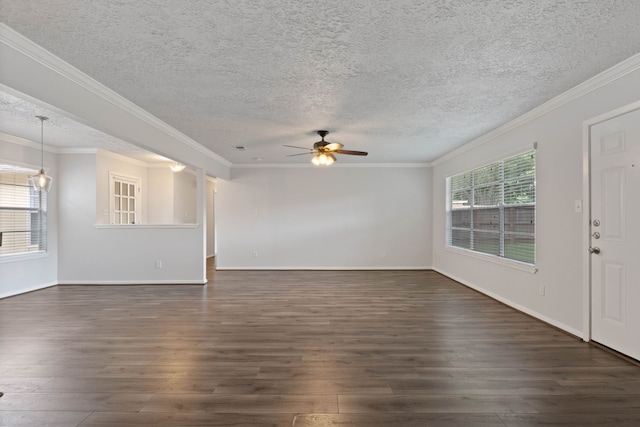 14138 Rosetta Dr, Cypress, TX 77429 - unfurnished living room with dark wood-style flooring, a ceiling fan, a textured ceiling, and ornamental molding