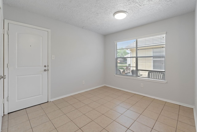 14138 Rosetta Dr, Cypress, TX 77429 - empty room with a textured ceiling and baseboards