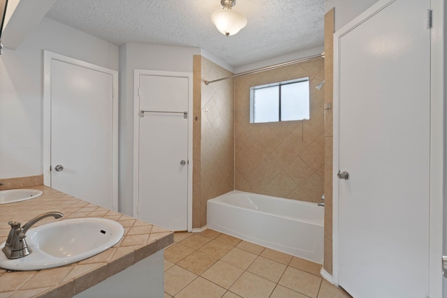 14138 Rosetta Dr, Cypress, TX 77429 - bathroom featuring shower / washtub combination, a textured ceiling, tile patterned floors, and double vanity