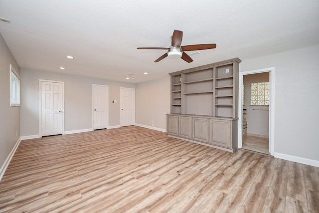 5906 Dumfries Dr, Houston, TX 77096 - unfurnished living room with ceiling fan, light wood-style floors, and recessed lighting