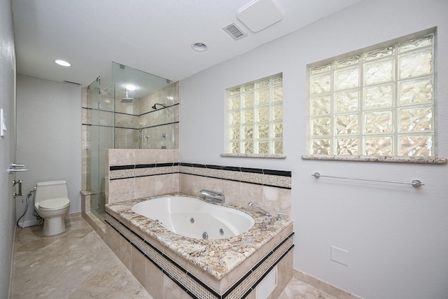 5906 Dumfries Dr, Houston, TX 77096 - full bathroom with a stall shower, a jetted tub, and recessed lighting