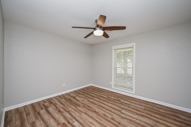 5906 Dumfries Dr, Houston, TX 77096 - empty room featuring wood finished floors and a ceiling fan