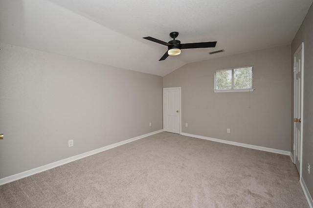 5906 Dumfries Dr, Houston, TX 77096 - unfurnished bedroom with carpet flooring, vaulted ceiling, and a ceiling fan