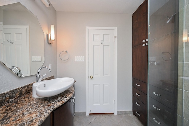 5906 Dumfries Dr, Houston, TX 77096 - full bathroom with vanity, a stall shower, and tile patterned flooring