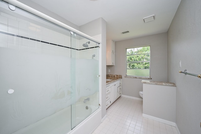 5906 Dumfries Dr, Houston, TX 77096 - bathroom with bath / shower combo with glass door, vanity, and tile patterned floors