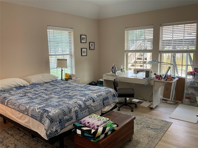 19 Trail Lk, Trinity, TX 75862 - bedroom with wood finished floors and an office area