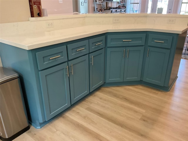 19 Trail Lk, Trinity, TX 75862 - kitchen with light wood-type flooring and light countertops