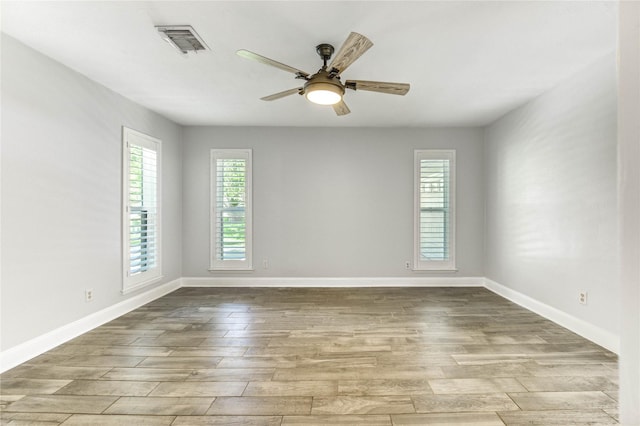 1904 Nursery Rd, The Woodlands, TX 77380 - empty room with wood finished floors and ceiling fan