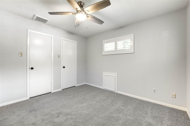 1904 Nursery Rd, The Woodlands, TX 77380 - unfurnished bedroom featuring carpet flooring and a ceiling fan