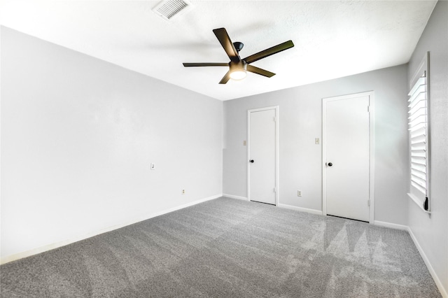 1904 Nursery Rd, The Woodlands, TX 77380 - unfurnished bedroom with carpet flooring and a ceiling fan