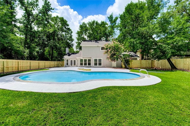 1904 Nursery Rd, The Woodlands, TX 77380 - view of swimming pool featuring french doors and a fenced backyard