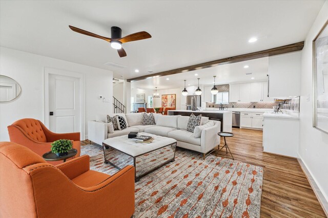 805 English St, Houston, TX 77009 - living room featuring light wood-style flooring, stairs, recessed lighting, and a ceiling fan