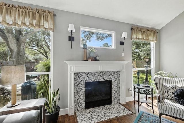 14506 Heron Marsh Dr, Cypress, TX 77429 - living room featuring a fireplace and wood finished floors