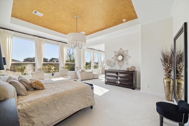 190 Monarch Trl, Sugar Land, TX 77498 - bedroom with a chandelier, carpet floors, and a tray ceiling