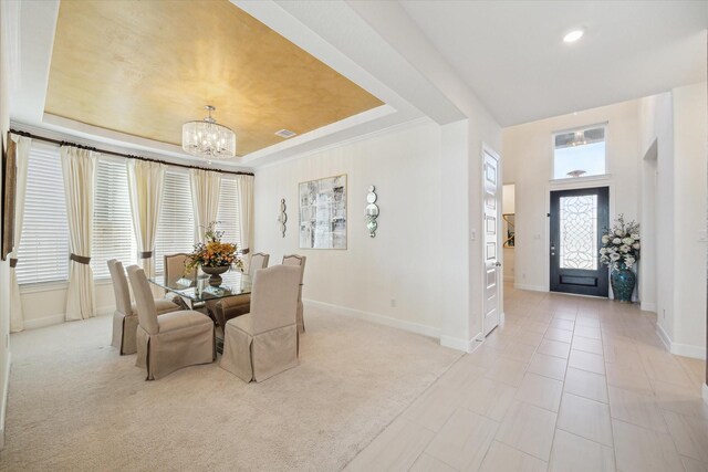 190 Monarch Trl, Sugar Land, TX 77498 - dining room with a chandelier, a tray ceiling, and recessed lighting