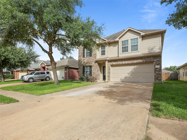5031 Rustling Branch Ln, Katy, TX 77449 - view of front facade featuring a garage, driveway, and brick siding