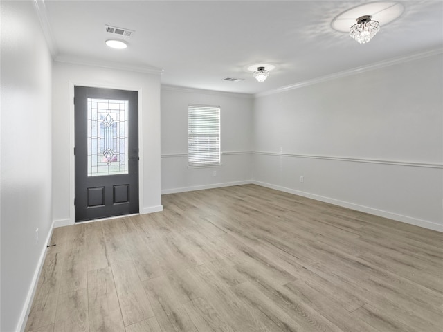 5031 Rustling Branch Ln, Katy, TX 77449 - entryway with ornamental molding and light wood finished floors