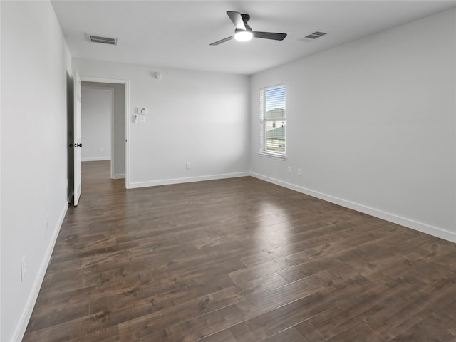 5031 Rustling Branch Ln, Katy, TX 77449 - empty room with a ceiling fan and dark wood finished floors