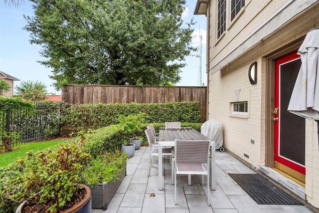 5603 Dolores St, Houston, TX 77057 - fenced backyard with outdoor dining space and a patio area