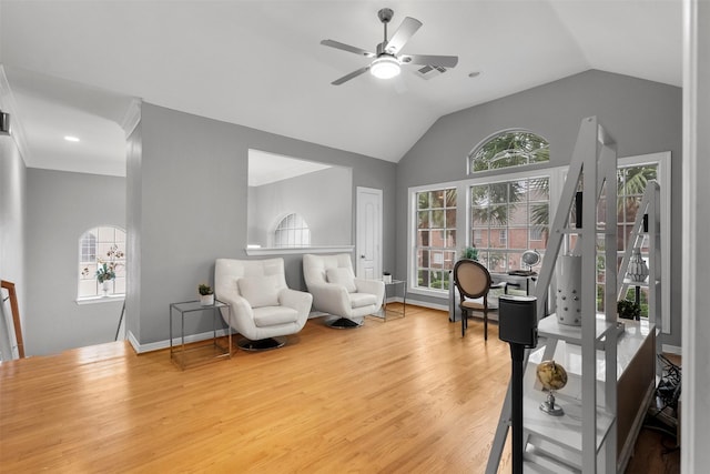 5603 Dolores St, Houston, TX 77057 - living area featuring a ceiling fan, plenty of natural light, wood finished floors, and lofted ceiling