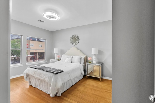 5603 Dolores St, Houston, TX 77057 - bedroom featuring baseboards and light wood-type flooring