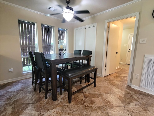 711 Holly Springs Dr, Conroe, TX 77302 - dining room with stone tile floors, ceiling fan, and ornamental molding