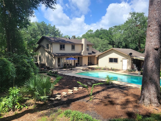 711 Holly Springs Dr, Conroe, TX 77302 - outdoor pool with a patio
