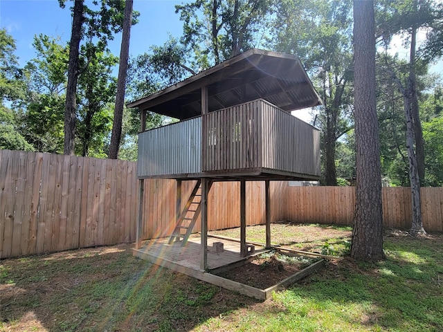 711 Holly Springs Dr, Conroe, TX 77302 - view of outdoor structure with a fenced backyard