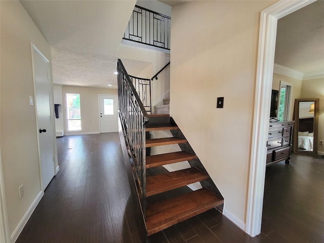 711 Holly Springs Dr, Conroe, TX 77302 - staircase with wood finished floors and crown molding